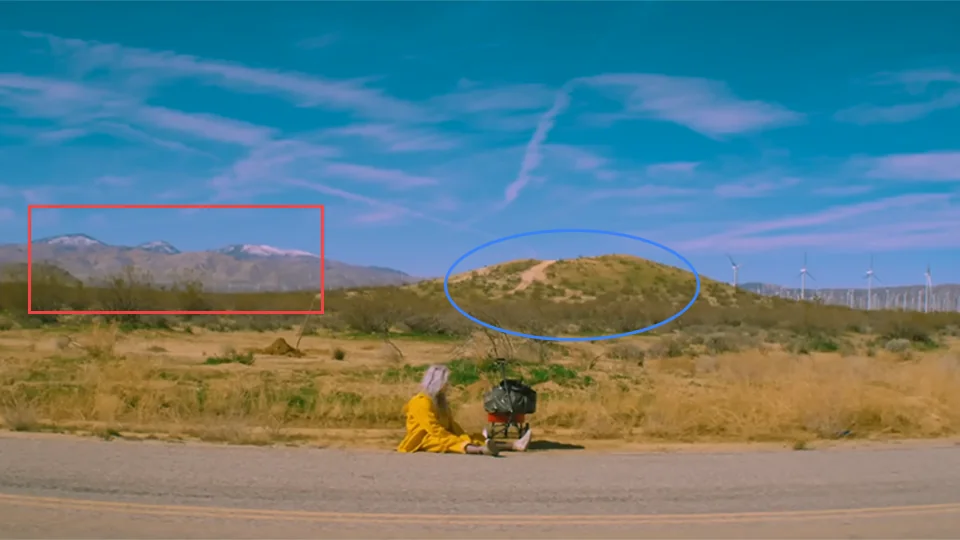 Billie Eilish on Mojave-Tropico Road in Bellyache music video at 0:02