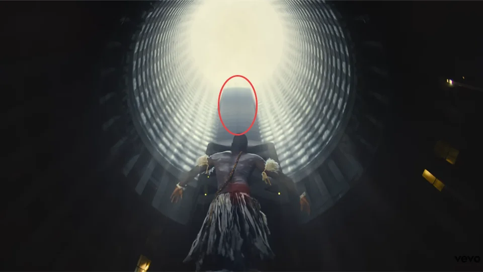 Aerial Google Earth view of the cylindrical Ponte Tower in Hillbrow in Makeba music video at 0:32